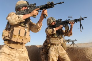 Cavalry Barracks is the home of the Welsh Guards. Here, soldiers of 7 Platoon, 2 Company Welsh Guards return fire in Helmand Province, Afghanistan (Cpl Dan Bardsley RLC, Crown Copyright)