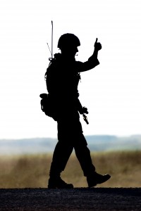 An infantry soldier gives the thumbs up sign during an exercise - by Cpl Ian Forsyth RLC [Crown Copyright]