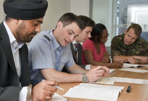 Civil servants meet with military personnel. [Photo by Harland Quarrington; Crown Copyright]