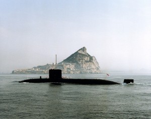 The Finance team also support overseas bases, such as Gibraltar - pictured here behind HMS Superb. [Crown Copyright]