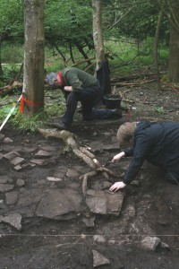 An image of an ex-Paratrooper and a University of Leicester archaeology student excavating the site of the Georgian house. (Helen Pickering; Crown Copyright)