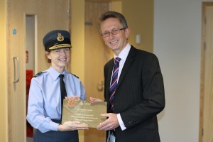 AVM West and Graham Jeffery with a commemorative plaque marking the completion of SLA at DMS Whittington. [Crown Copyright]