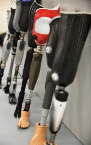 Prosthetic limbs are lined up against a wall at the Defence Medical Rehabilitation Centre, Headley Court. [Cpl Richard Cave RLC (Phot) MOD/CrownCopyright2013]