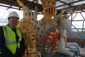 Jon Butler at completed heraldic crest on roof of Royal Artillery Barracks, Woolwich. [Crown Copyright/MOD2014]