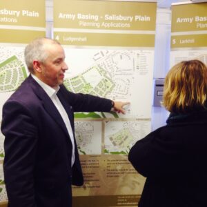 Stephen Harness explaining the plans to a local resident (Crown Copyright/ MOD2015)