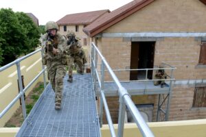 Soldiers from 1 YORKS training on high level walkways at Copehill Down Village. [Landmarc Support Services 2015]