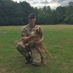 Private Matthew Greig of 1 Military Working Dogs Regiment, with Bracken. [Crown Copyright]