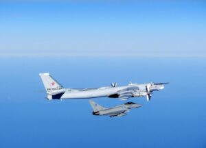 A Typhoon from RAF Lossiemouth intercepting a Russian Bear aircraft as part of a QRA scramble, 16 September 2014. [Crown Copyright/MOD 2014]