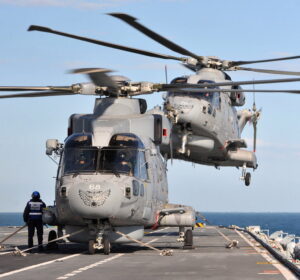 20121104 - Merlin helicopters from 814 Naval Air Squadron are pictured onboard HMS Illustrious during Exercise Joint Warrior near Scotland [Crown Copyright - MOD2012]