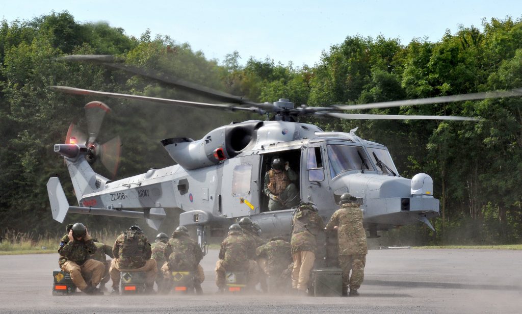 Ground crew reservists are pictured during a training exercise with the new Wildcat helicopter. [Crown Copyright/MOD]