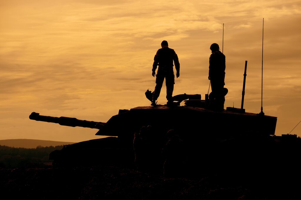 Soldiers with the Royal Wessex Yeomanry onboard a Challenger 2 main battle tank during a training exercise at Lulworth Cove in Dorset. [Crown Copyright/MOD2013]