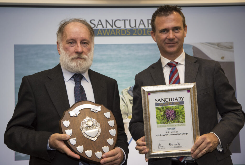 Bob Haycock collecting his Individual Achievement Award from Defence Minister Mark Lancaster. [Crown Copyright/MOD2016]