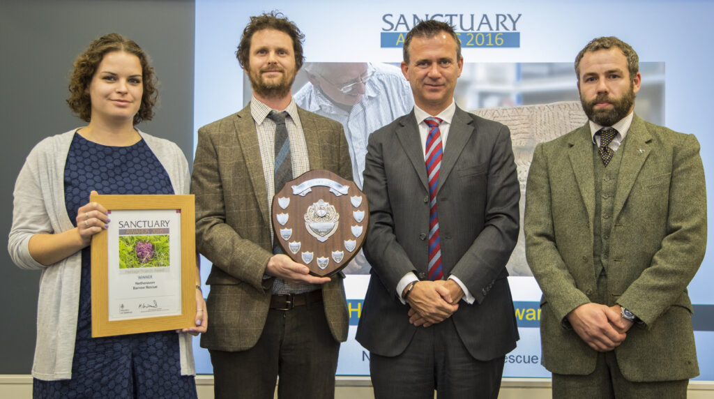 The Netheravon Barrow Rescue team collecting their Heritage Award. [Crown Copyright/MOD2016]