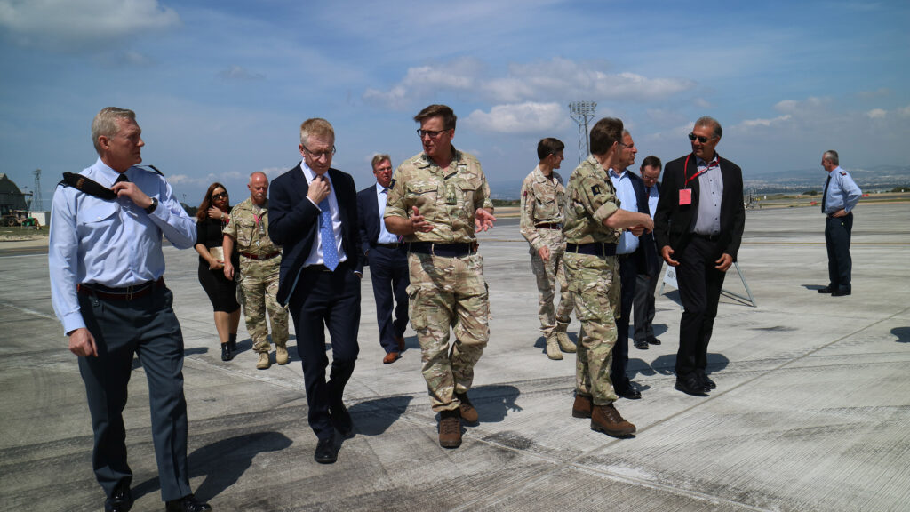 Graham receiving an on-site briefing on DIO's work to renovate the runway at RAF Akrotiri, Cyprus. [Crown Copyright/MOD2016]