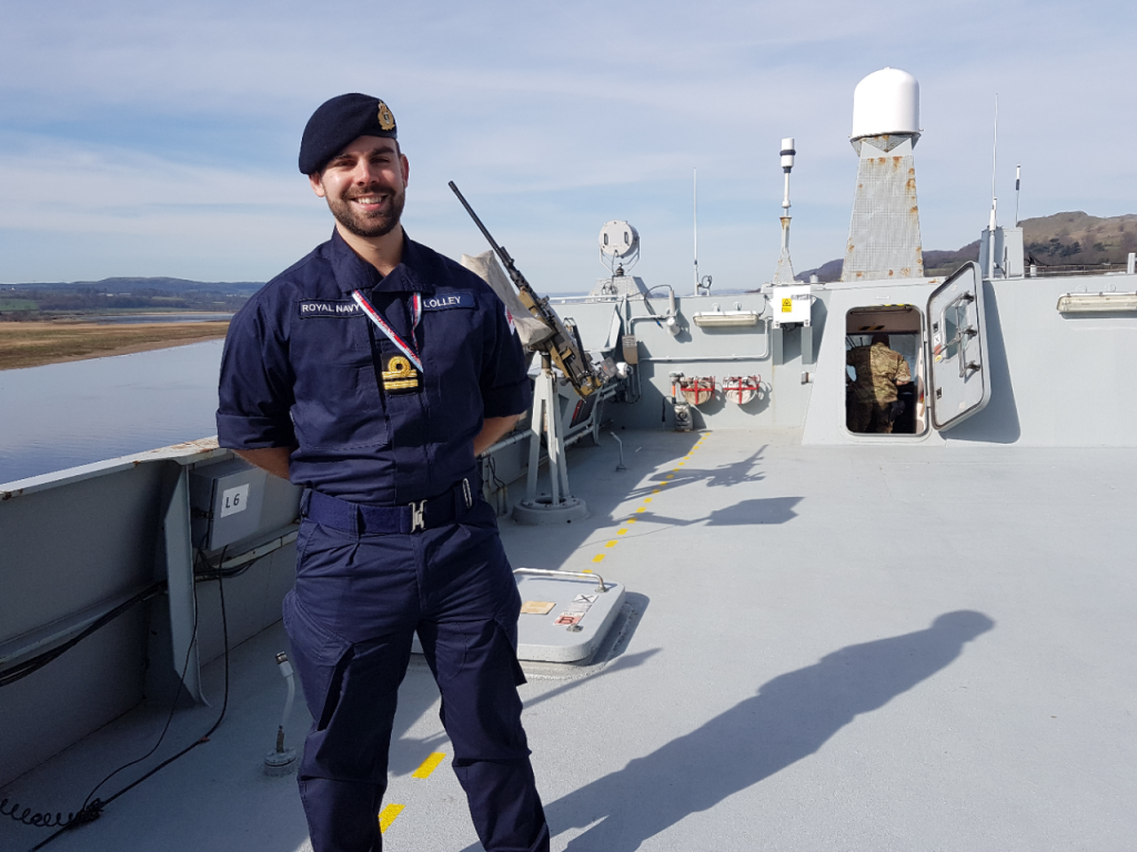 Reservist Ben Lolley on the upper deck of the Danish warship HDMS Absalon. [Crown Copyright, MOD 2017]