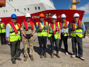 DIO's David Graham, Brigadier Baz Bennett and DIO's Geoff Robson, DIO's Lucy Bogue, John Lovell from VolkerStevin and Paul Stubbs from RambollUK open the jetty in Mare Harbour (Crown Copyright, MOD 2018)