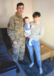 Family enjoying their new service accommodation in Ashdown, Wiltshire [Crown Copyright, MOD 2018]