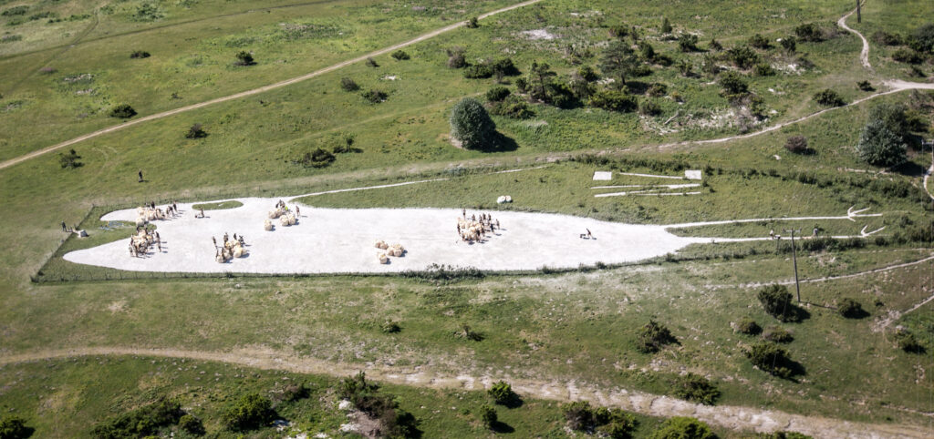 Aerial image of volunteers spreading chalk on Bulford Kiwi [Crown copyright, MOD 2018]