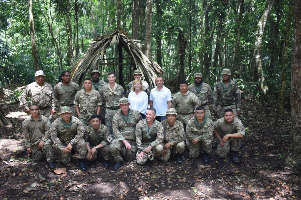 Kate Harrison posing with members of the 'Jungle School' in uniform, at BATSUB.