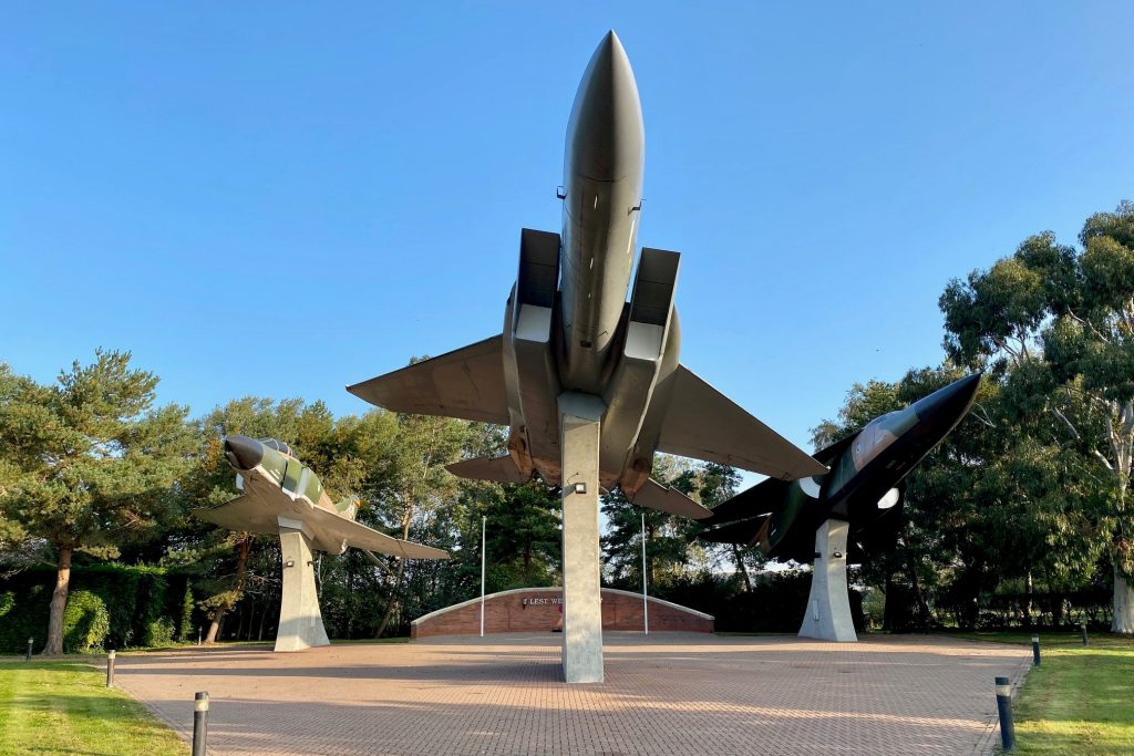 Three aircraft attached to plinths at RAF Lakenheath.